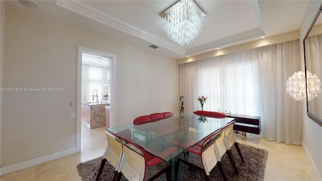 1486 Commodore Way, Hollywood, FL 33019 - dining area with a chandelier and ornamental molding