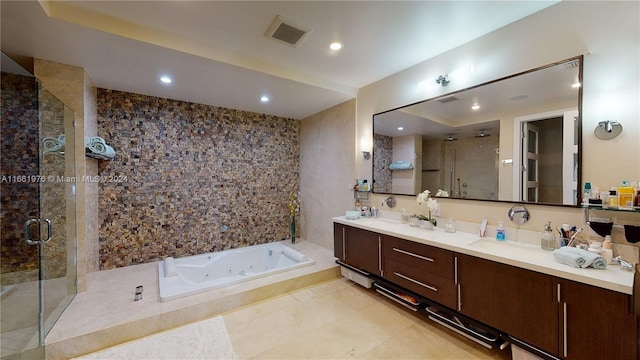 bathroom featuring plus walk in shower and vanity