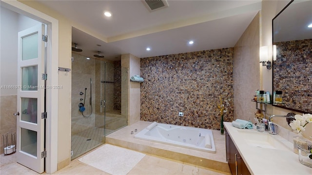 bathroom with vanity and plus walk in shower