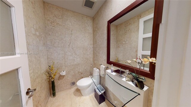 1486 Commodore Way, Hollywood, FL 33019 - bathroom featuring vanity and tile walls