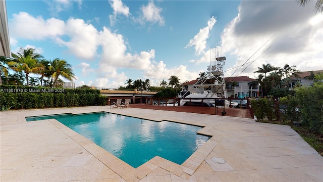 view of pool with a patio area