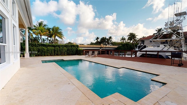 view of pool featuring a patio area