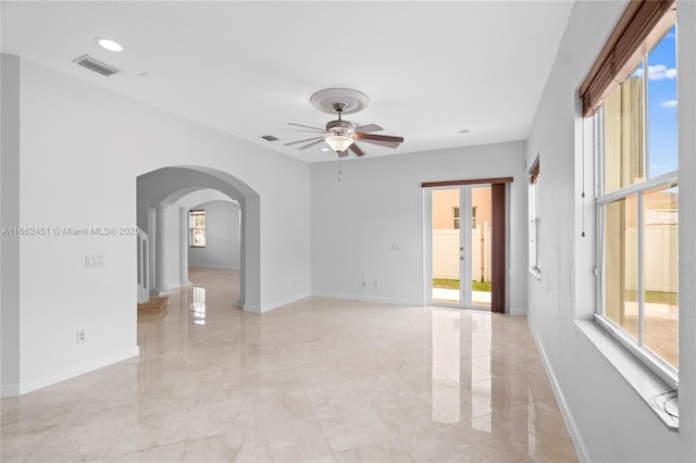 spare room featuring ceiling fan