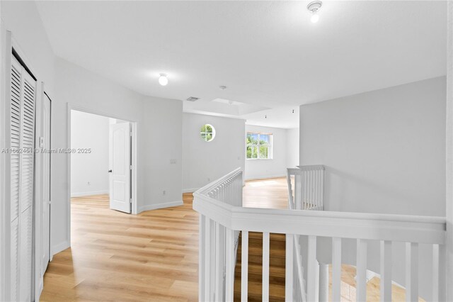 hall featuring light hardwood / wood-style flooring