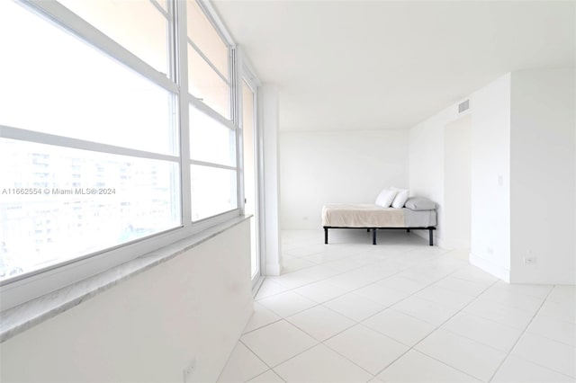 interior space featuring light tile patterned floors