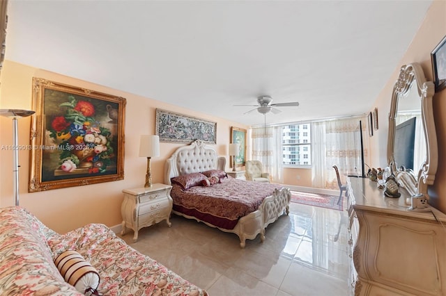 tiled bedroom with ceiling fan