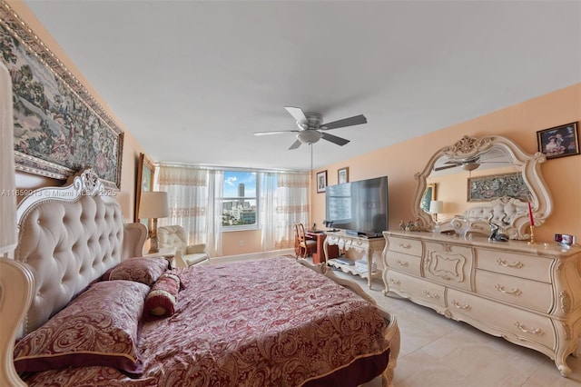 bedroom featuring ceiling fan and light tile patterned floors