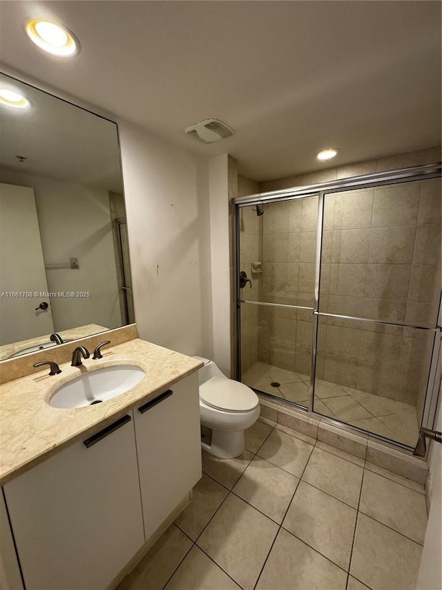 14951 Royal Oaks Ln Unit 1504, North Miami, FL 33181 - full bath with a stall shower, toilet, tile patterned flooring, recessed lighting, and vanity