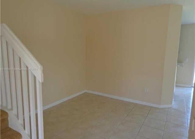 view of tiled spare room