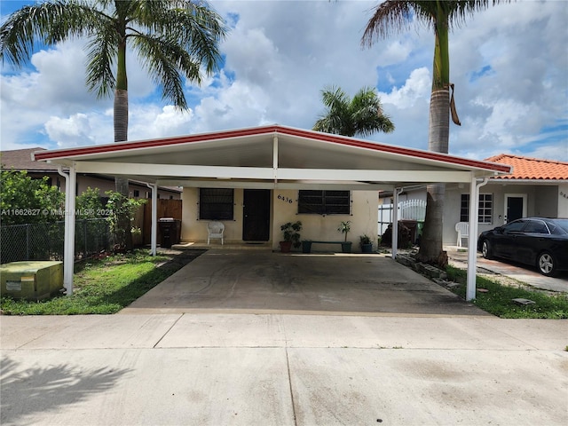 view of front of house with a carport