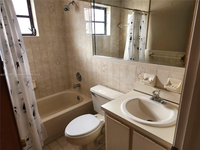 full bathroom with decorative backsplash, a wealth of natural light, vanity, and toilet