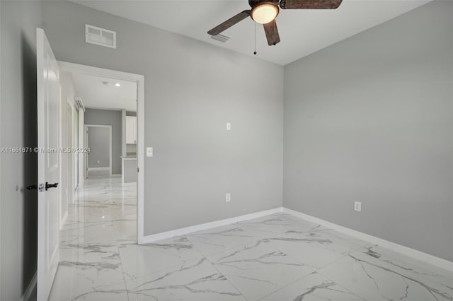 empty room featuring ceiling fan