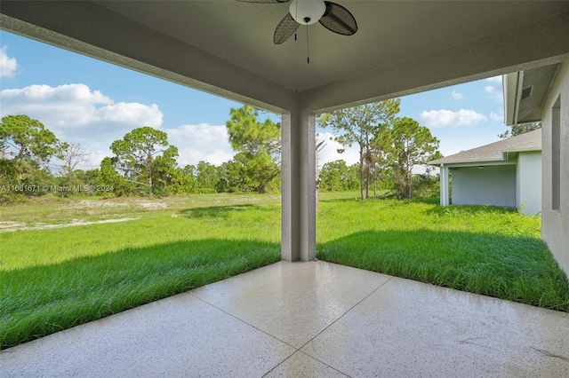 view of patio / terrace featuring ceiling fan