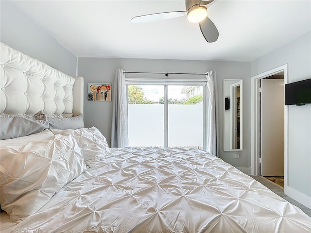 bedroom featuring a ceiling fan and access to outside