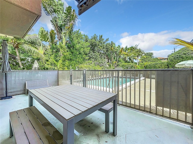 balcony featuring a patio area and outdoor dining space