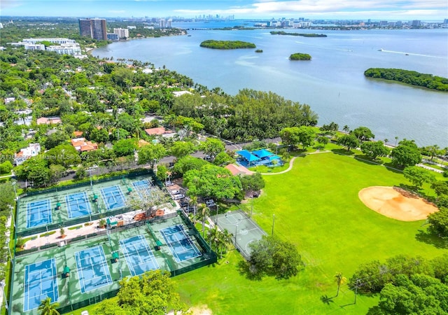 birds eye view of property featuring a water view and a view of city
