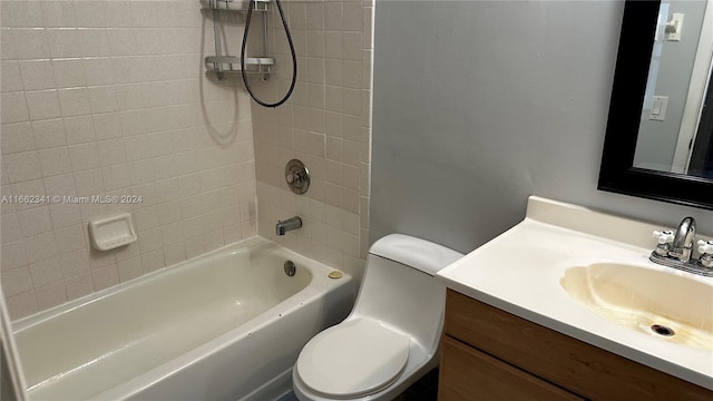 full bathroom with vanity, toilet, and tiled shower / bath