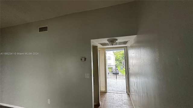 entryway with vaulted ceiling