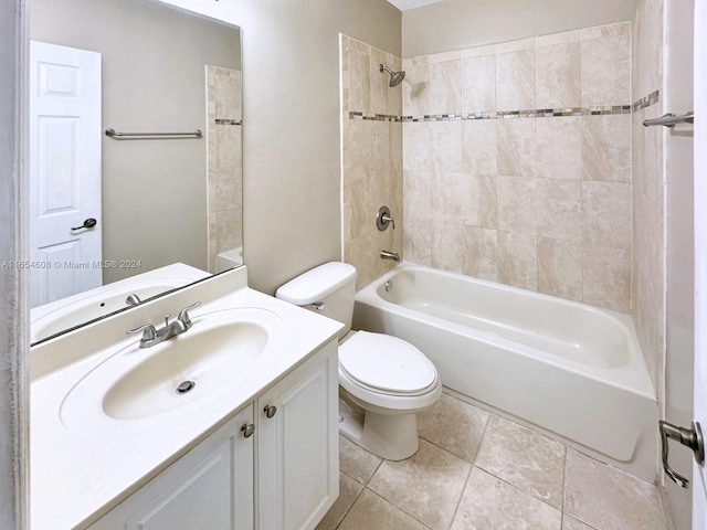 full bathroom with vanity, toilet, tile patterned floors, and tiled shower / bath