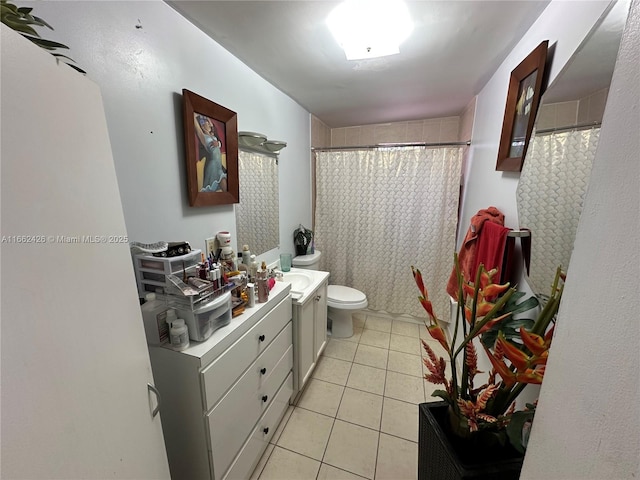 full bath with tile patterned flooring, a shower with curtain, vanity, and toilet