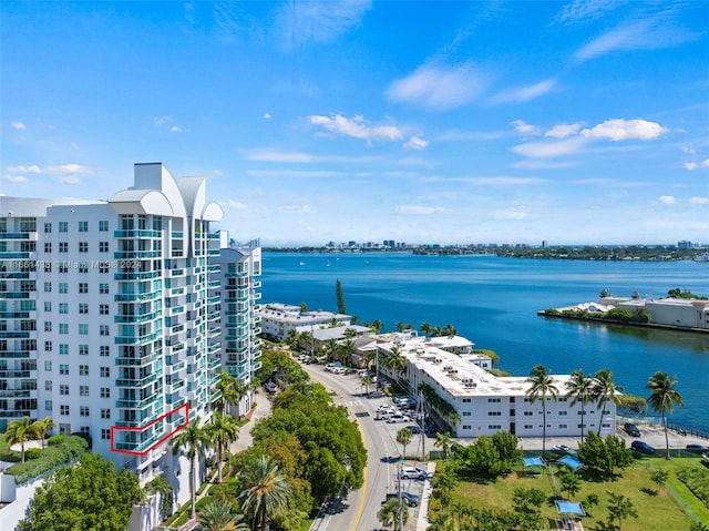 birds eye view of property featuring a water view