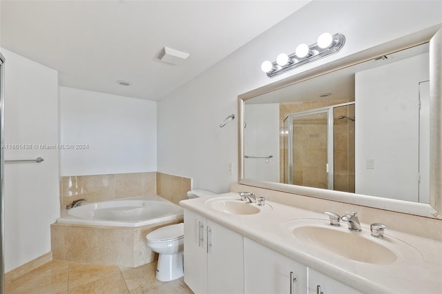 full bathroom with plus walk in shower, tile patterned flooring, vanity, and toilet