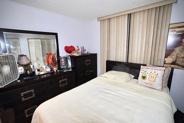 bedroom featuring a textured ceiling