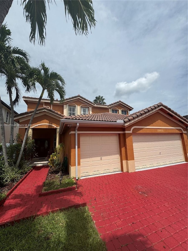 view of front of property with a garage