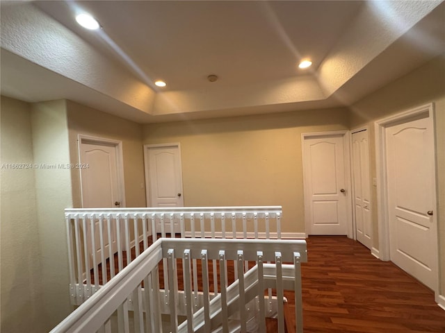 corridor featuring dark hardwood / wood-style floors