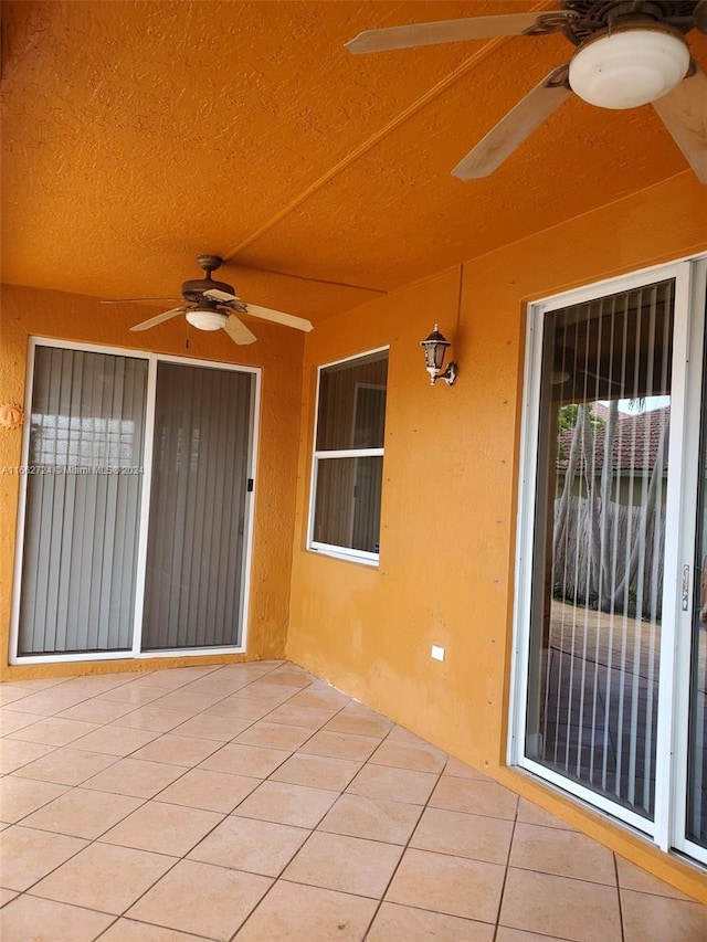 view of patio / terrace featuring ceiling fan