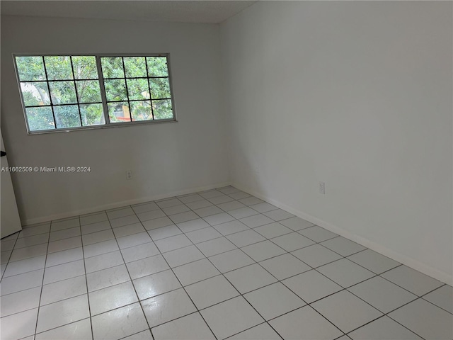 view of tiled spare room