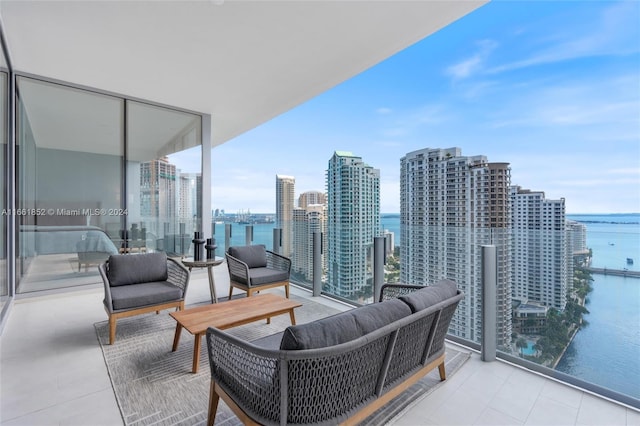 balcony featuring a water view