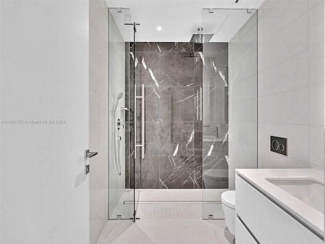 bathroom featuring vanity, toilet, an enclosed shower, and tile walls