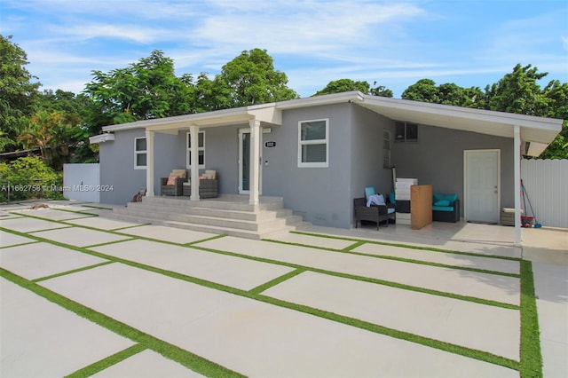 view of front of home with a patio area