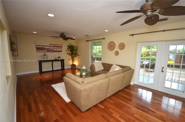 living room featuring french doors, dark hardwood / wood-style flooring, and ceiling fan