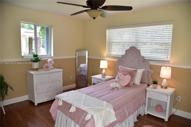 bedroom featuring ceiling fan and dark hardwood / wood-style floors