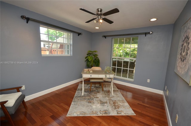 office featuring dark wood-type flooring and ceiling fan