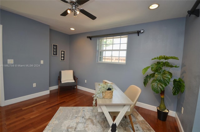 office space with ceiling fan and dark hardwood / wood-style floors