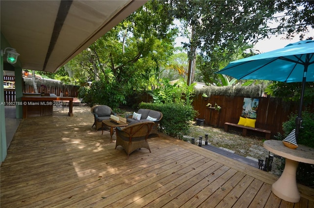 deck with an outdoor living space