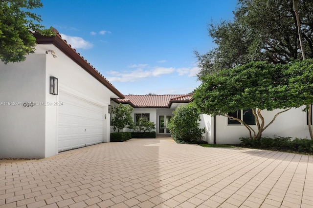 view of patio featuring a garage