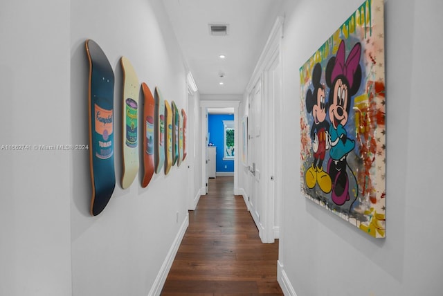 hallway featuring dark hardwood / wood-style floors