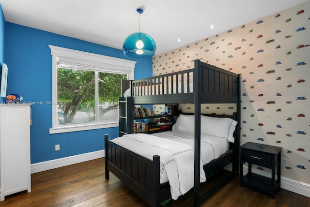 bedroom featuring dark hardwood / wood-style flooring