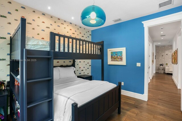 bedroom featuring dark wood-type flooring