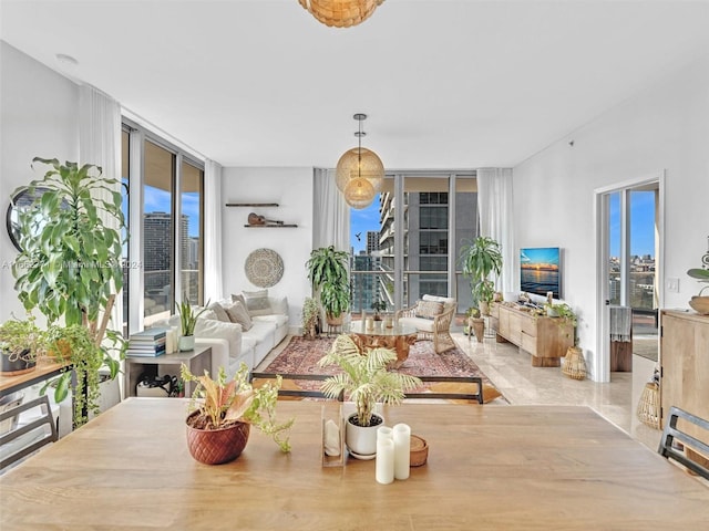 living room with floor to ceiling windows and plenty of natural light