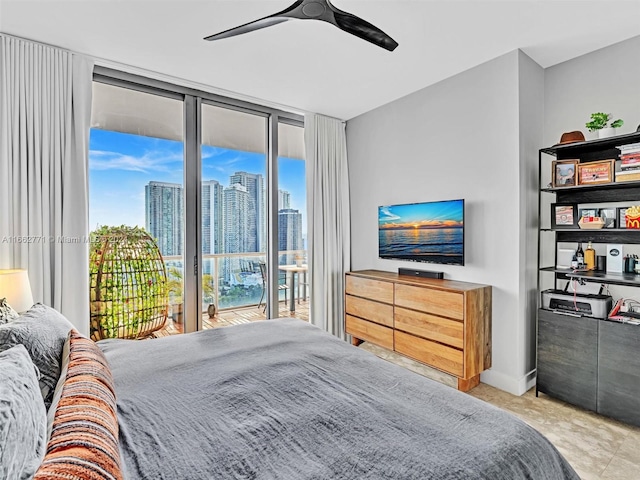 bedroom featuring access to outside and ceiling fan