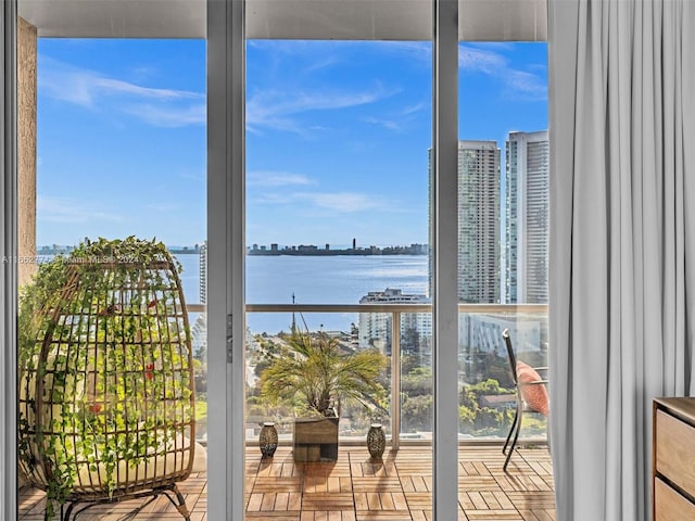 balcony featuring a water view