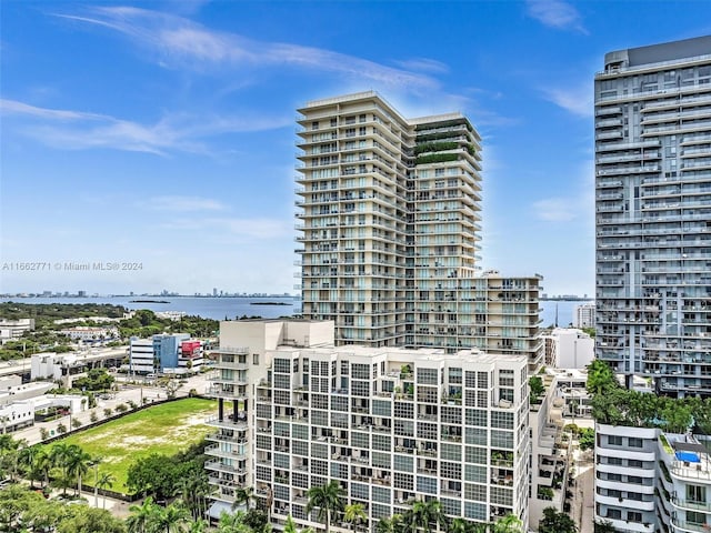 view of property with a water view