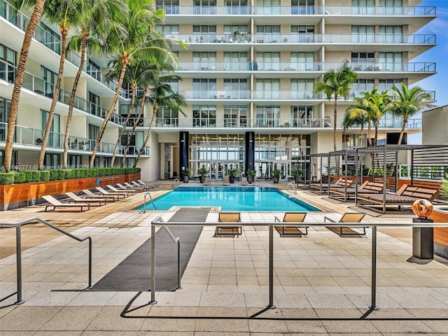 view of swimming pool featuring a patio