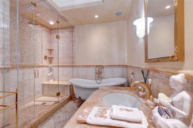 9801 NW Collins Ave Unit Ph8, Bal Harbour, FL 33154 - bathroom featuring recessed lighting, tile walls, a soaking tub, and a stall shower