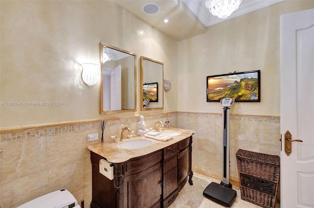 bathroom featuring tile walls, vanity, and toilet